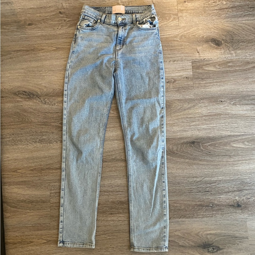 REVOLVE ripped jeans.